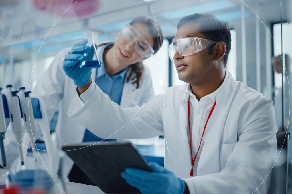 Biotech scientists collaborating, representing SCIRENT’s blend of global and regional expertise in cardiovascular clinical research.