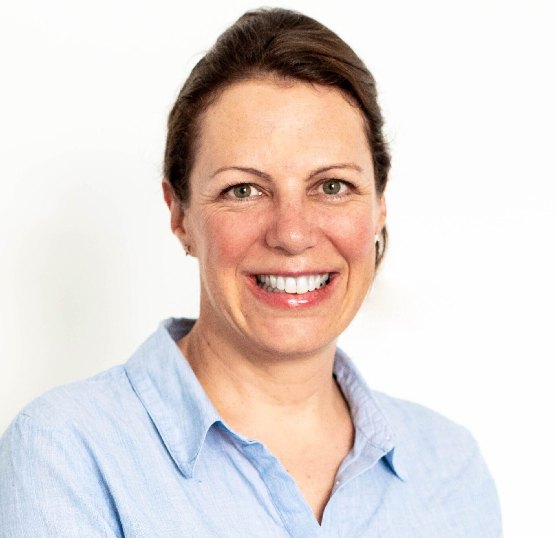 Portrait of Angelika Gaufer, a marketing executive at SCIRENT, speaking during an interview.